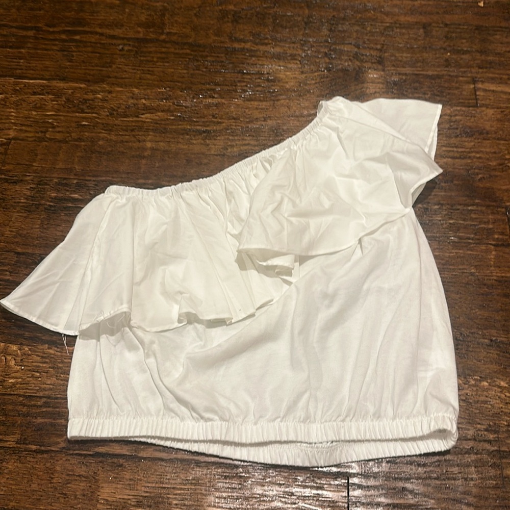 white target one shoulder with ruffle white top